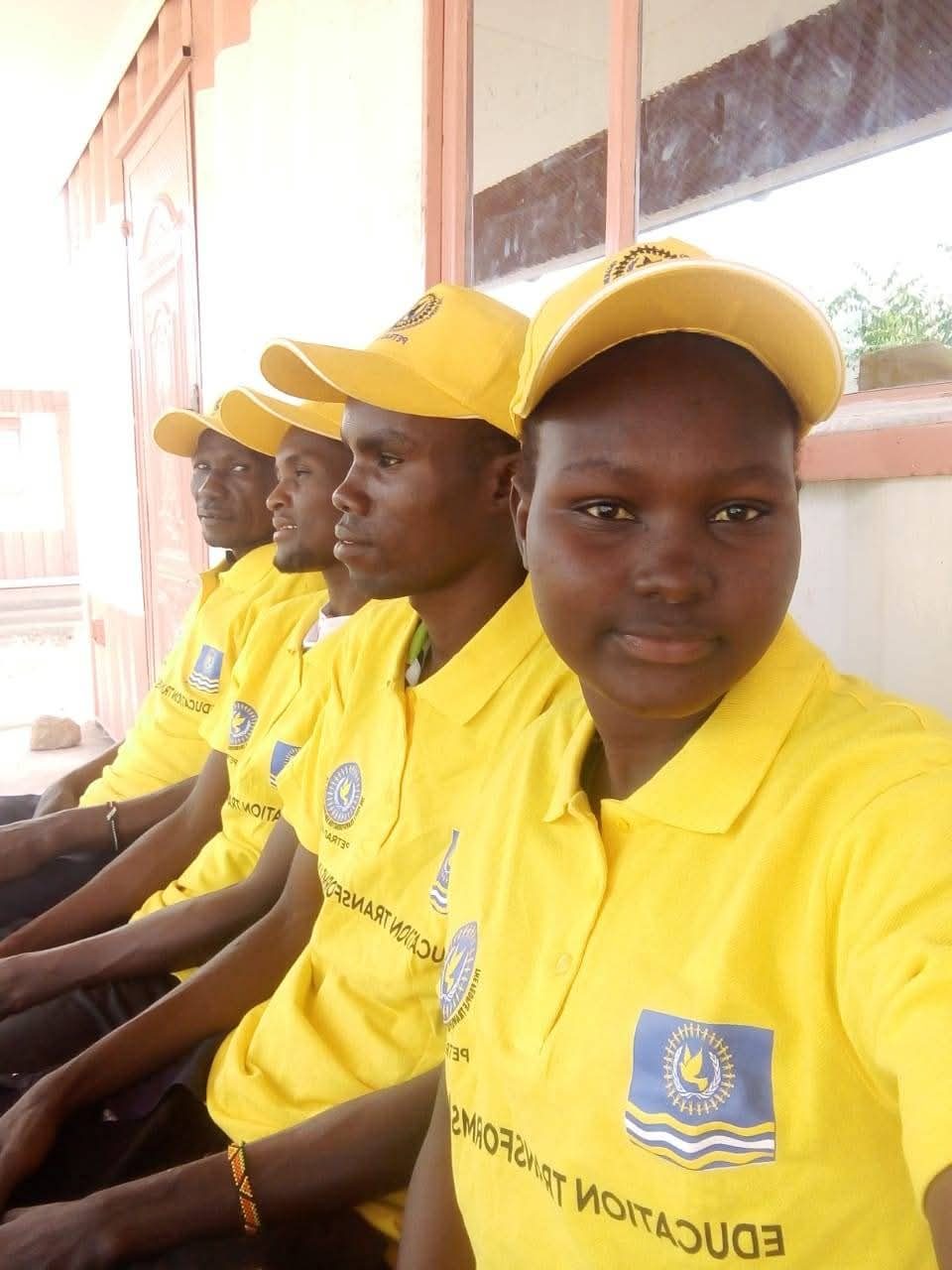 PETRAD AID education research programme group photo — host community and refugees
