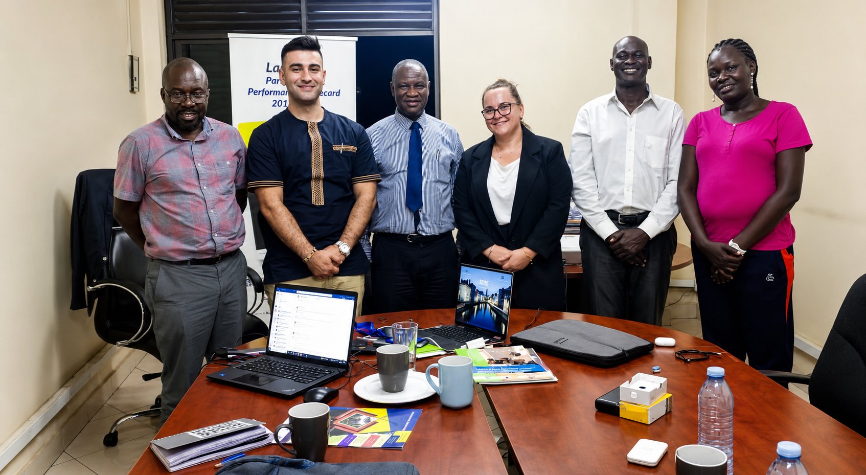 PETRAD AID SACCO registration meeting — team members and partners